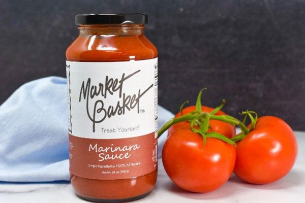 Market Basket Marinara Sauce posing with fresh tomatoes