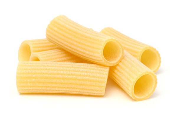 Italian pasta "rigatoni" isolated on white background